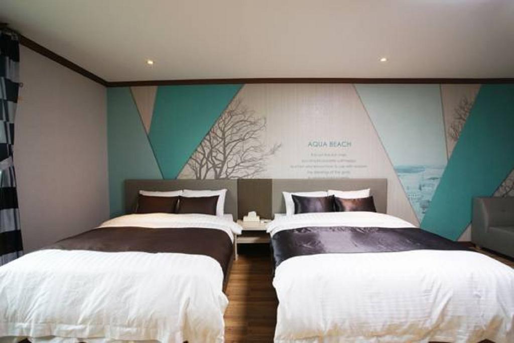 Seongsan Aqua Beach Hotel Согвіпо Номер фото