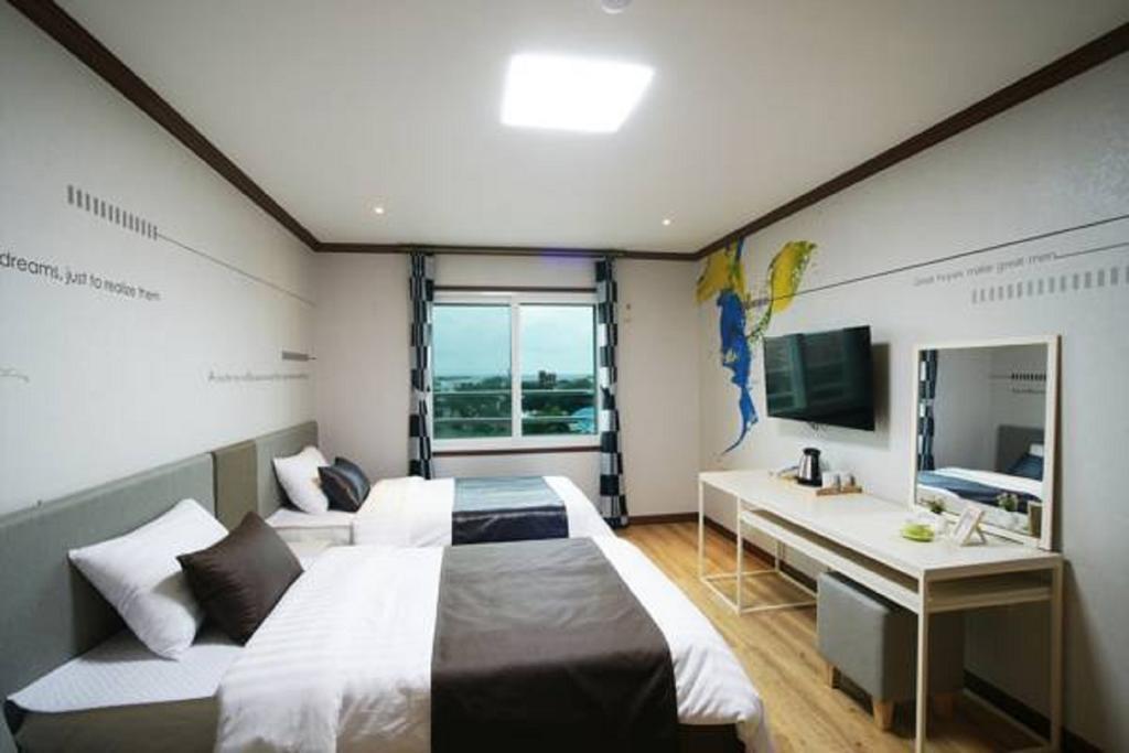 Seongsan Aqua Beach Hotel Согвіпо Номер фото