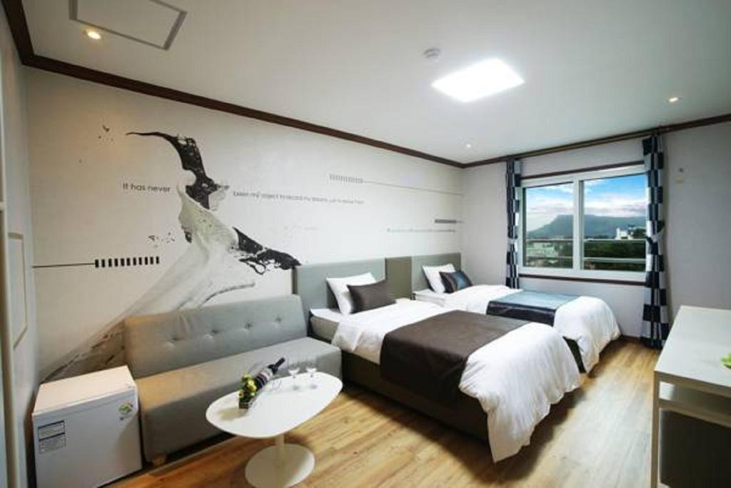 Seongsan Aqua Beach Hotel Согвіпо Номер фото