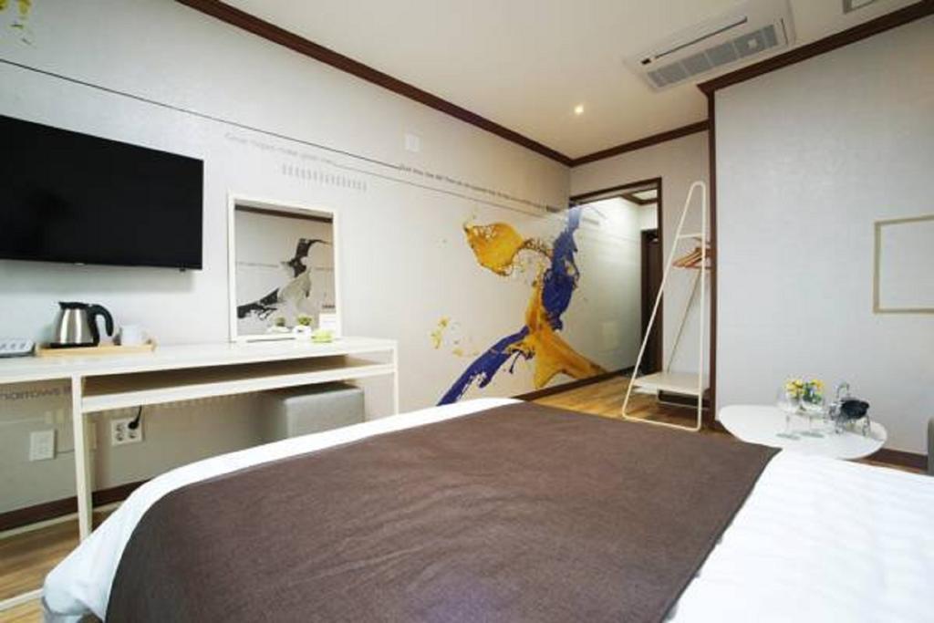 Seongsan Aqua Beach Hotel Согвіпо Номер фото
